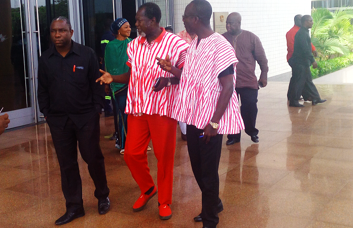 Mr Allotey Brew-Hammond (middle), the PPP’s National Chairman, and other members of the party leaving the court premises after proceedings. Picture: EMMANUEL EBOHAWKSON